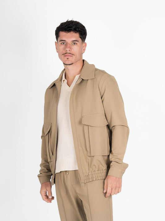 Set pantaloni e giacca beige