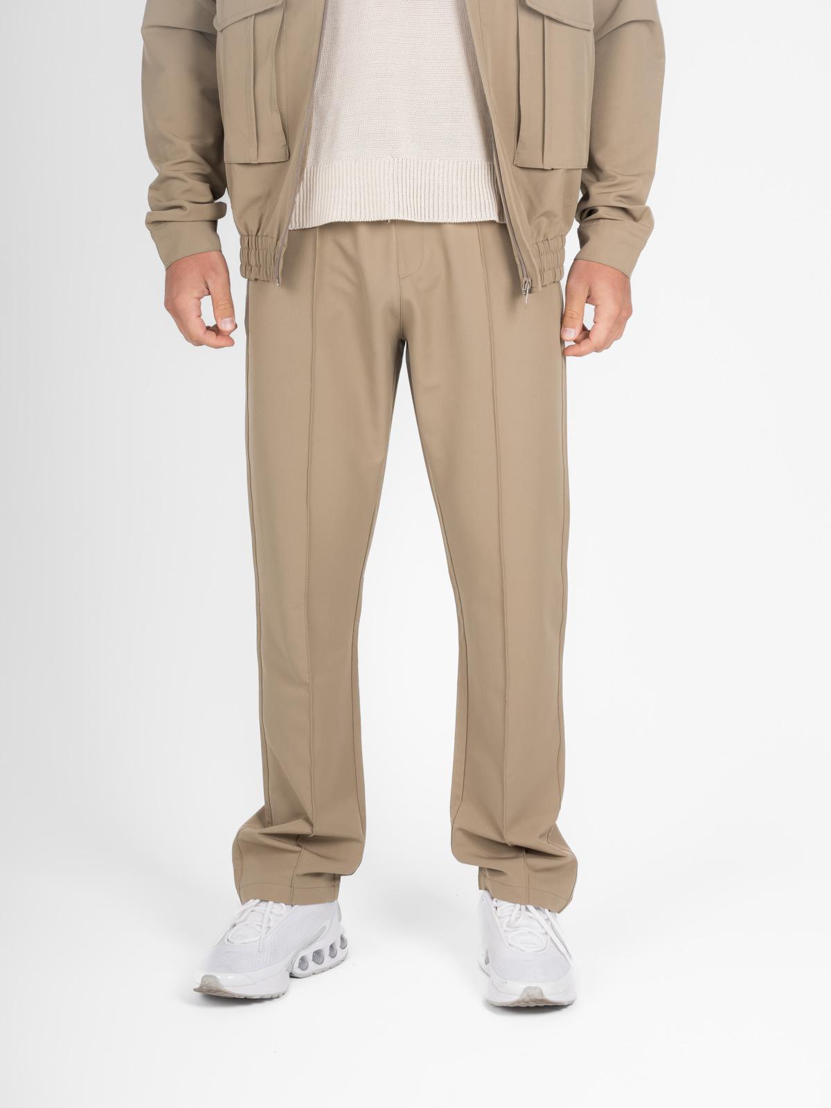 Set pantaloni e giacca beige
