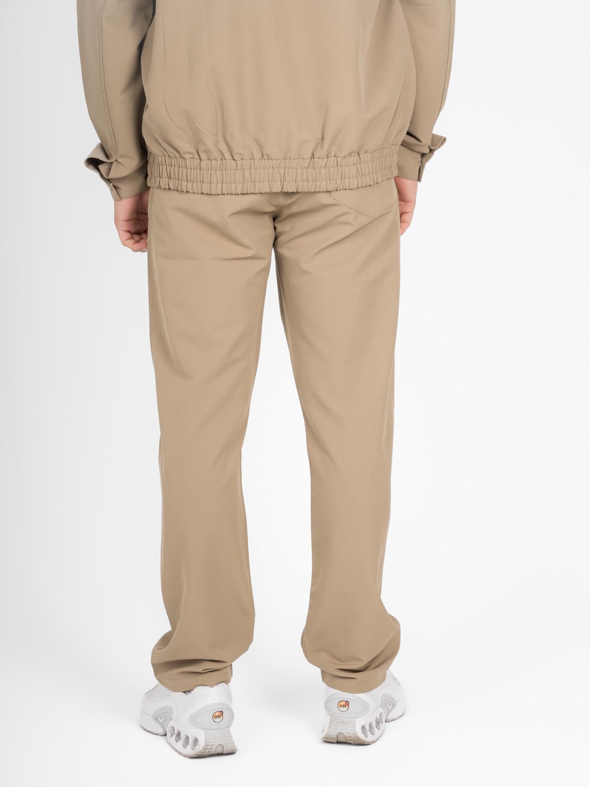 Set pantaloni e giacca beige