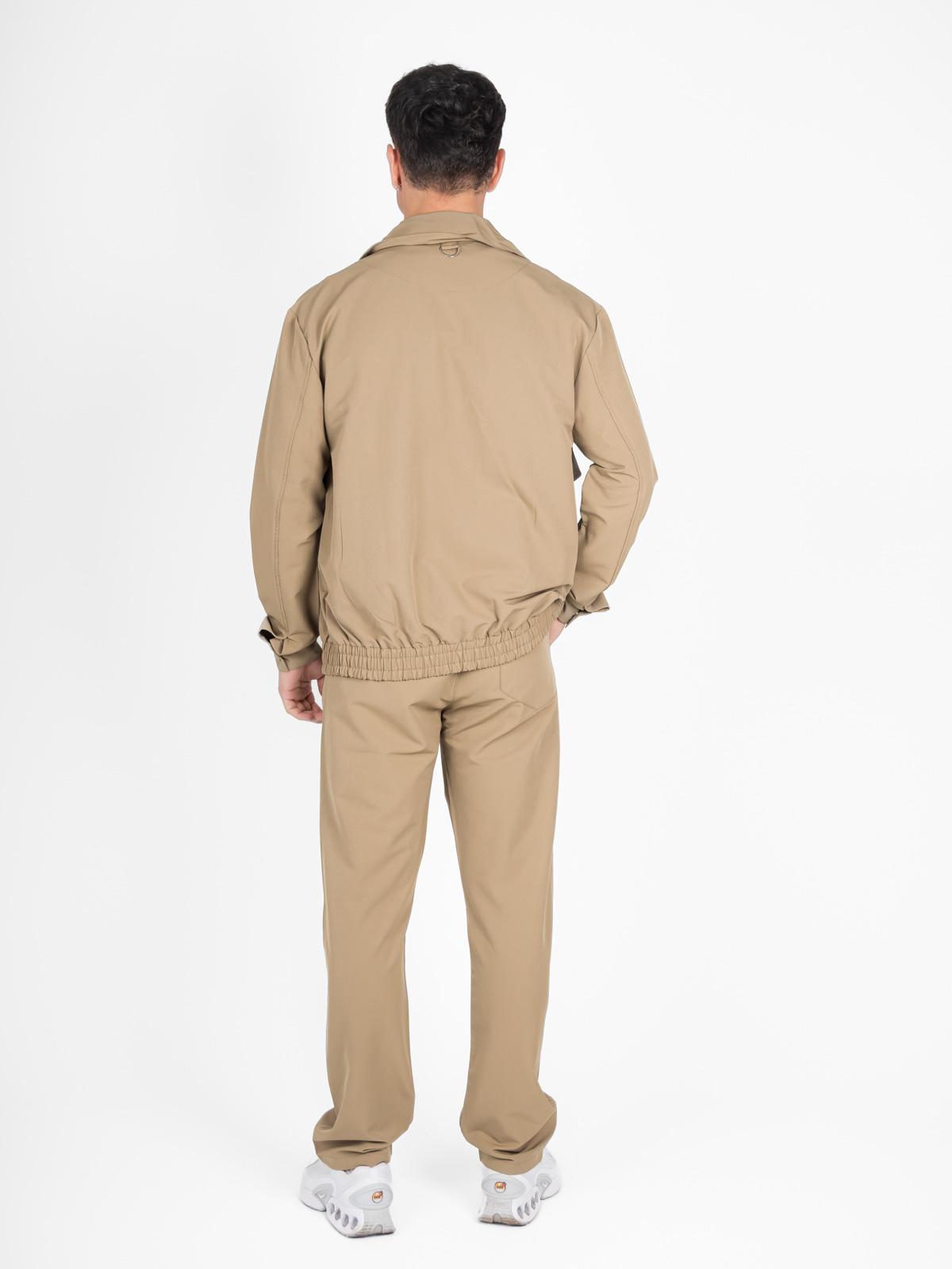 Set pantaloni e giacca beige
